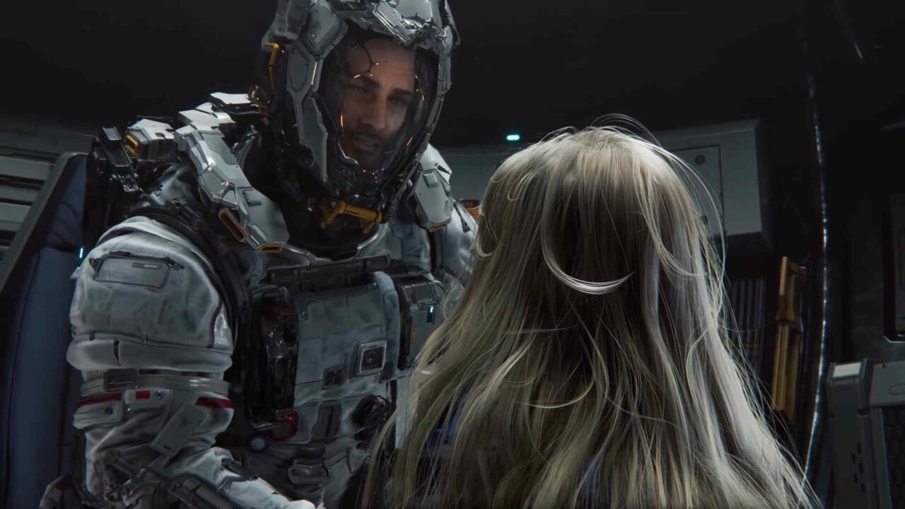 Hugh sentando de frente para Diana em uma conversa.